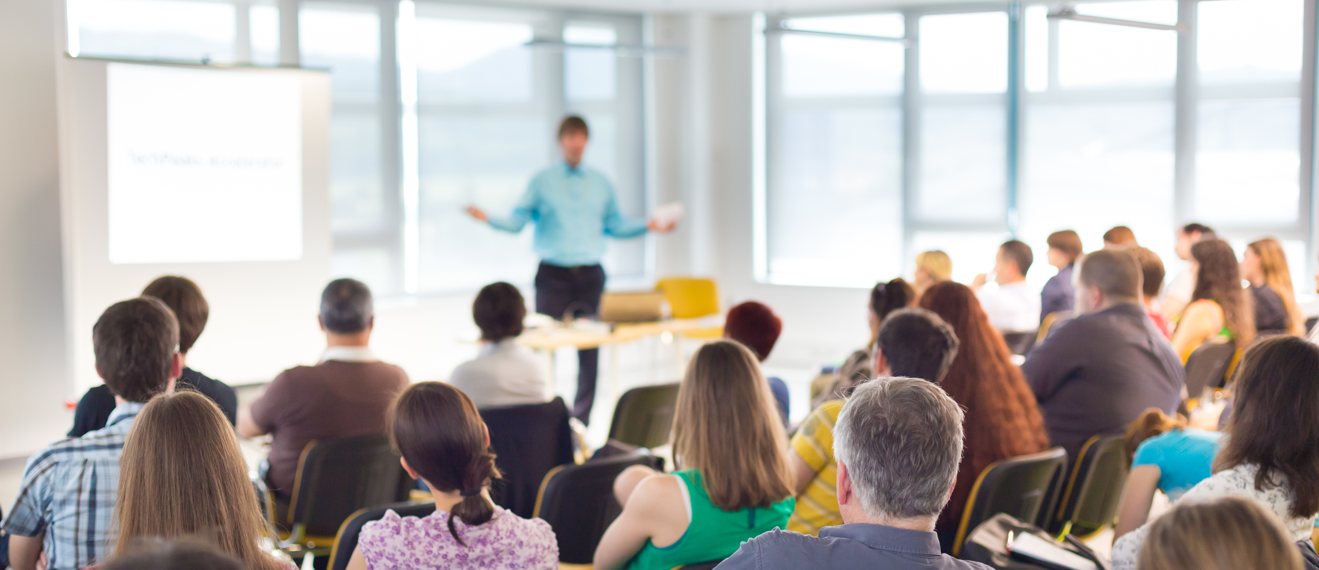 Speaker-Giving-Talk-Business-Meeting-Audience-in-conference-hall-iSpeak